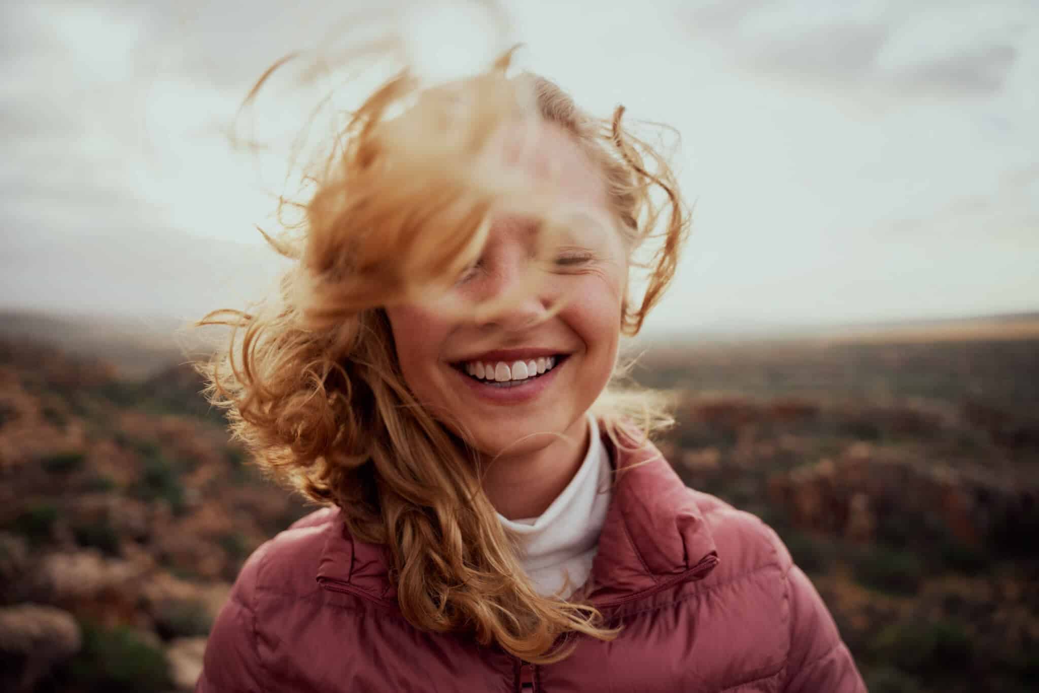 Hair Flying Happy Woman | Sheperd Integrative Dermatology in Mount Pleasant, SC